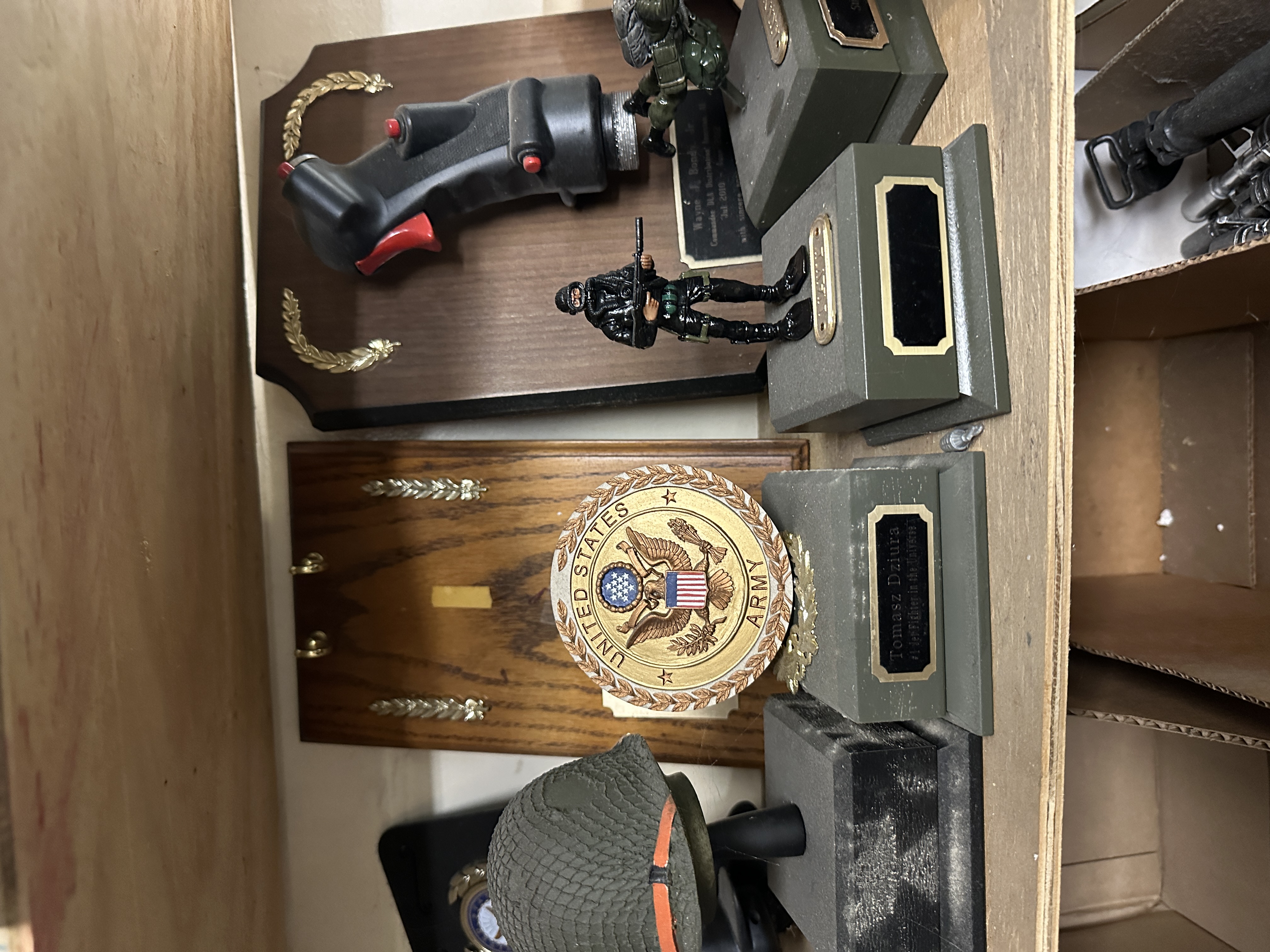 Shelves of helmets and plaques